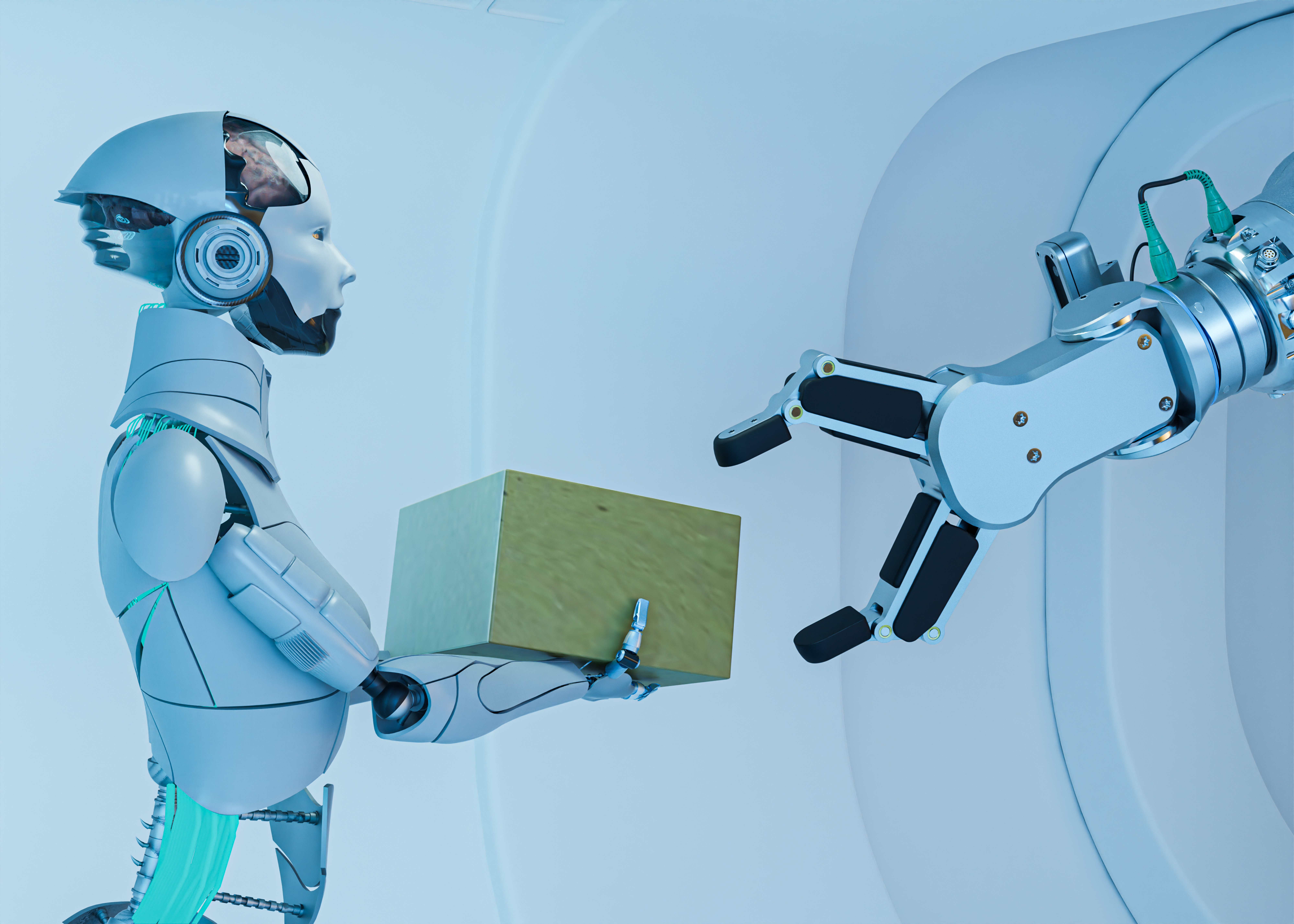 A robot passing a box to a robotic arm
